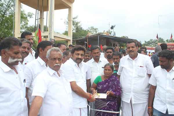 Dmk District secretary financial assistance to a woman suffering from cancer Dmk District secretary financial assistance to a woman suffering from cancer