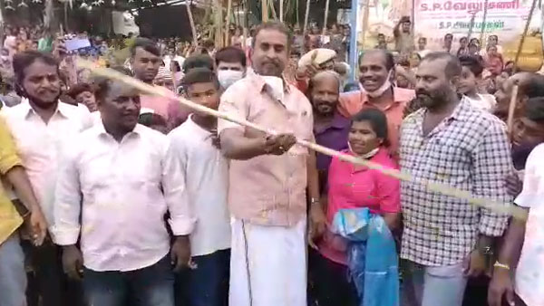 Minister Velumani attends the Pongal festival in the Kuniyamuthur and performs Silambam Minister Velumani attends the Pongal festival in the Kuniyamuthur and performs Silambam