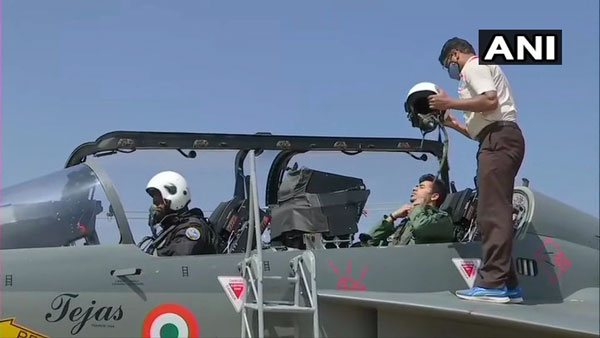 MP Tejasvi Surya takes a sortie on LCA Tejas aircraft at Aero India MP Tejasvi Surya takes a sortie on LCA Tejas aircraft at Aero India