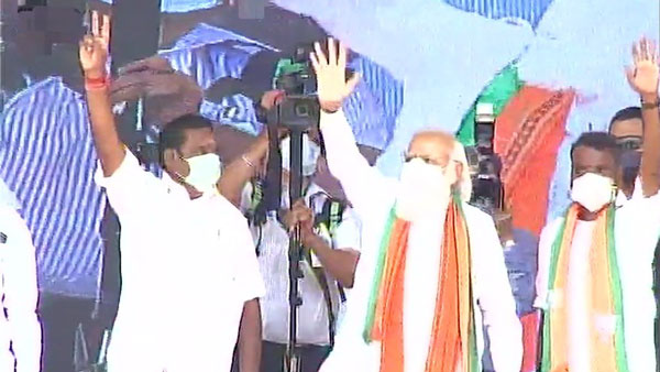 PM Narendra Modi gets Vel as gift from Tamil Nadu BJP in Dharapuram PM Narendra Modi gets Vel as gift from Tamil Nadu BJP in Dharapuram