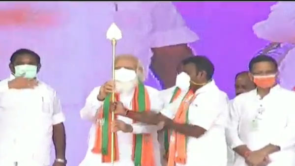 PM Narendra Modi gets Vel as gift from Tamil Nadu BJP in Dharapuram PM Narendra Modi gets Vel as gift from Tamil Nadu BJP in Dharapuram
