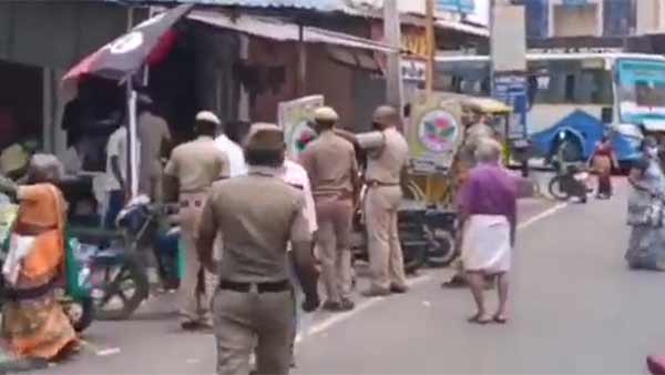 DMK AIADMK debate at the polling station in Karur: Police lathi charge DMK AIADMK debate at the polling station in Karur: Police lathi charge
