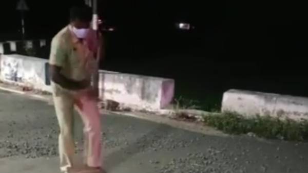 Scattered pebbles on the road; Good deeds done by the police to prevent the accident Scattered pebbles on the road; Good deeds done by the police to prevent the accident