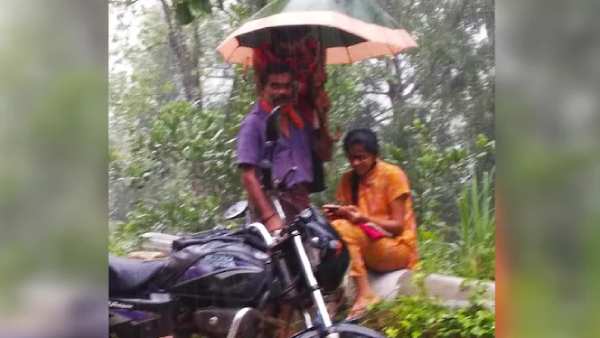 மழையில் நனைதல்