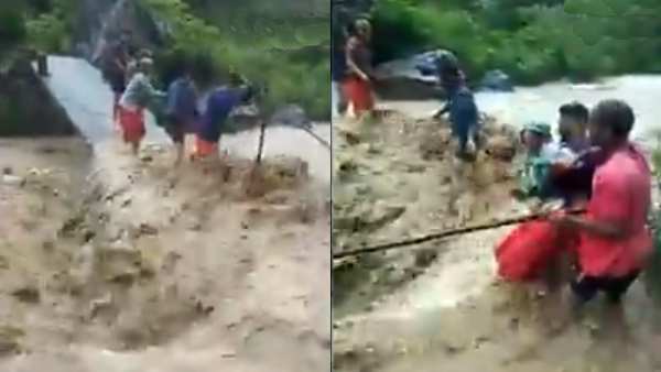 வீடியோ: ஒரு நொடி  மிஸ்ஸானாலும் 'உயிர்' உடம்புக்கு சொந்தமில்லை.. பயங்கர வெள்ளத்தை கடக்கும் மக்கள் 