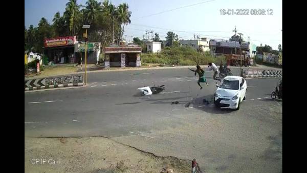 Pollachi car bike accident caught on cctv footage video Pollachi car bike accident caught on cctv footage video