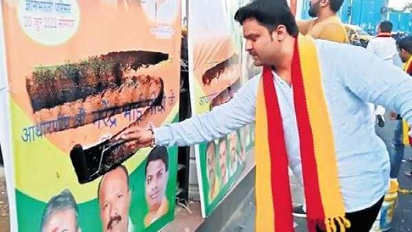 Kannada activists remove Hindi in PM Modi Welcome banners Kannada activists remove Hindi in PM Modi Welcome banners