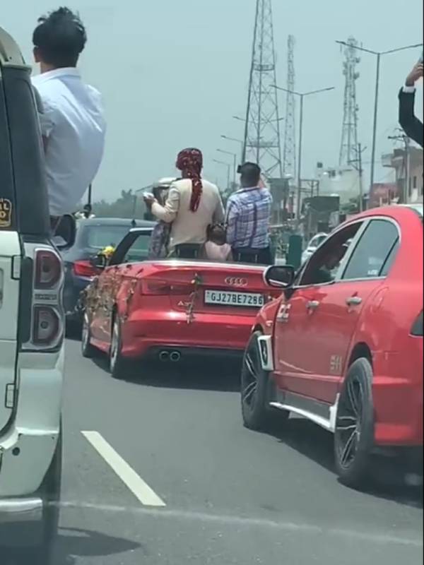 UP police fined Rs.2 lakh for marriage groom for dancing in car at road UP police fined Rs.2 lakh for marriage groom for dancing in car at road