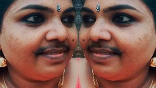 பிடிச்சிருக்கு, வச்சிருக்கேன்.. இத கிண்டல் பண்ண என்ன இருக்கு? கேரளாவில் பெண்ணுக்கு முறுக்கு மீசை 