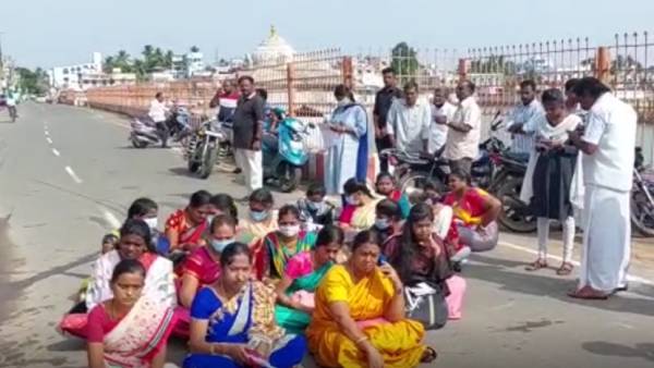 கிழித்து எறிந்து போராட்டம்
