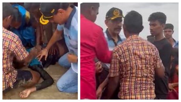 DGP Sylendra Babu gives first aid to a boy who drowned in Chennai Marina DGP Sylendra Babu gives first aid to a boy who drowned in Chennai Marina