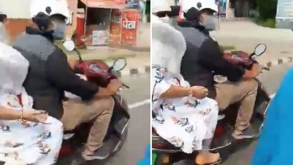 பார்க்க மனைவி மாதிரியே இருக்கே! ஆணுடன் பைக்கில் போன பெண்! மடக்கிய கணவன்.. மாஸ்க்கை திறந்தால்.. “ஓஹோ”