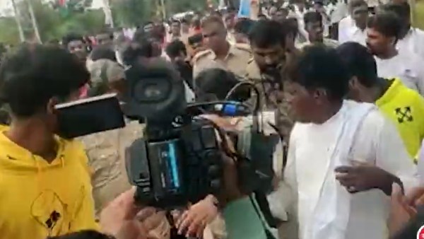 டீசர்ட்டை கழற்றிய போலீஸ்