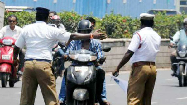 போலீசாருடன் வாக்கு வாதம்