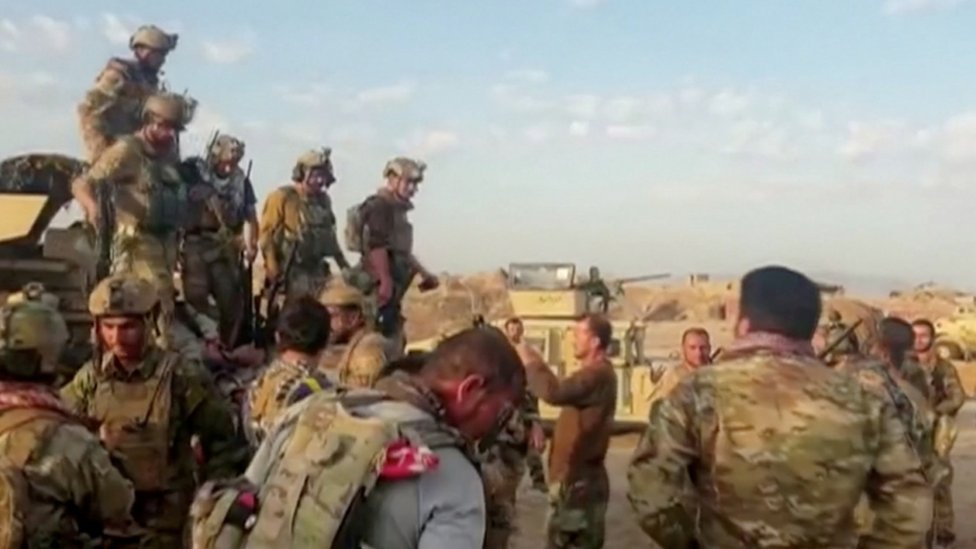 Afghan security forces outside Kunduz in July Afghan security forces outside Kunduz in July